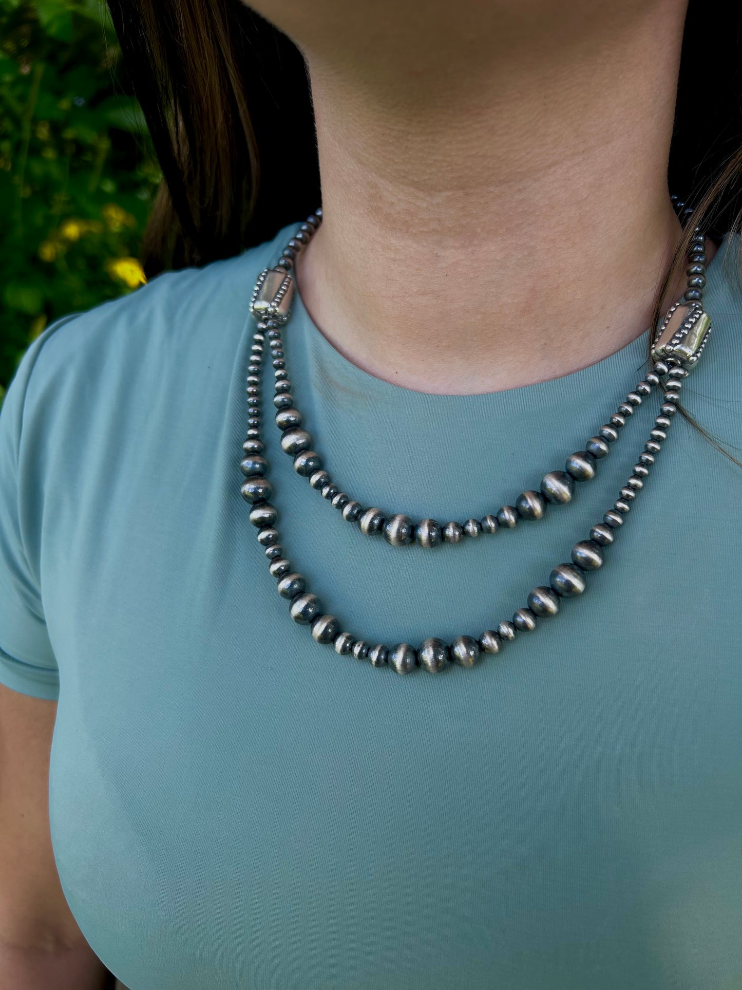 Double strand graduated barrel bead